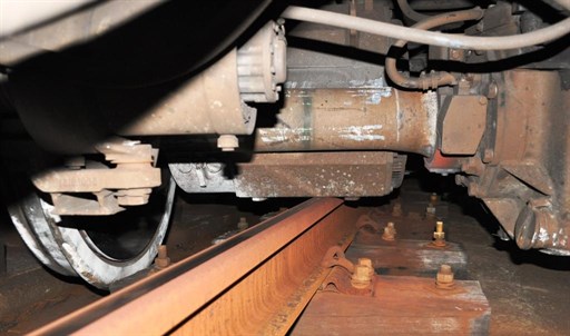 Motor resting on rail head